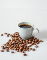 Black coffee in a white cup with coffee beans scattered on a light background photo
