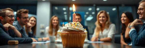Celebrating a birthday with friends in a modern office setting featuring a colorful cupcake photo