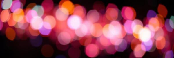 Vibrant bokeh lights create a colorful atmosphere for celebrations at night photo