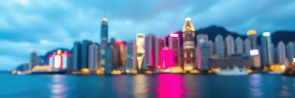 Vibrant cityscape of Hong Kong at night with colorful lights reflecting on the water photo