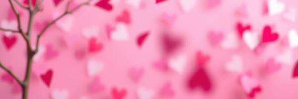 Valentine's Day decorations with hearts on a pink background creating a festive atmosphere photo