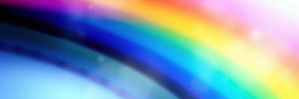Colorful rainbow arching across a bright sky after a light rain shower in a serene outdoor setting photo