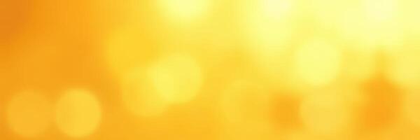 Vibrant golden background shining with warm light and soft bokeh effects during a summer evening photo