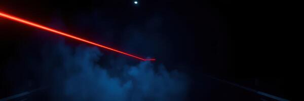 Vibrant laser cutting through dark fog in an atmospheric setting during a nighttime event photo