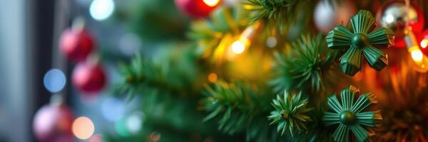 Holiday decorations featuring a lush green Christmas tree with colorful ornaments and twinkling lights photo