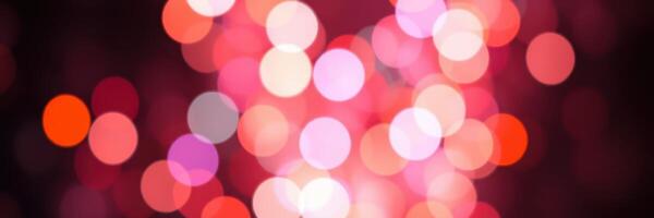 Colorful bokeh lights creating a vibrant atmosphere during a nighttime celebration photo