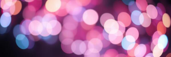 Colorful bokeh lights create a magical atmosphere during a nighttime celebration in a vibrant setting photo