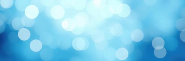 Soft blue glimmers of light create a serene atmosphere in this abstract background image ideal for calming designs photo