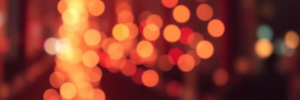 Warm glow of city lights during a festive evening with blurred bokeh background photo