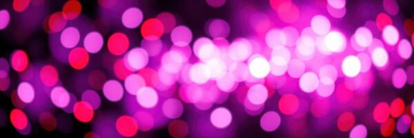 Colorful bokeh lights create a festive atmosphere during an evening celebration photo