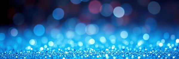 Sparkling blue background creates a mesmerizing bokeh effect perfect for festive occasions and artistic projects photo