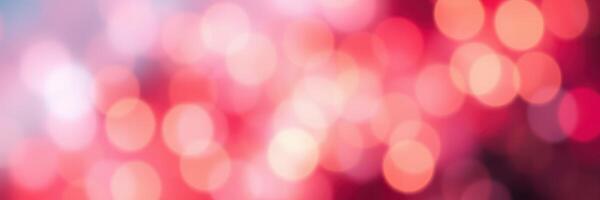 Abstract red bokeh lights sparkle softly creating a dreamy background for celebration and festive occasions photo