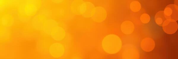 Warm orange and yellow bokeh lights create a vibrant and cheerful atmosphere during a sunny afternoon gathering photo