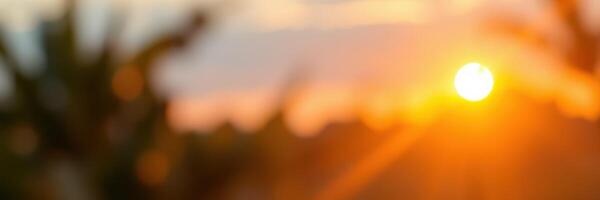 Beautiful sunset casting warm light over a serene landscape during golden hour photo