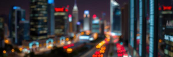 City skyline illuminated at night showcasing vibrant lights and bustling activity photo