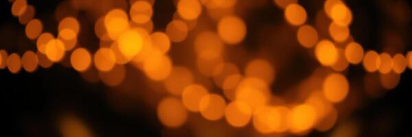 Beautiful warm bokeh lights create a magical atmosphere during an evening gathering in a cozy setting photo