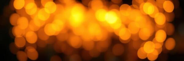 Vibrant golden bokeh lights create a warm and festive atmosphere during an evening celebration photo