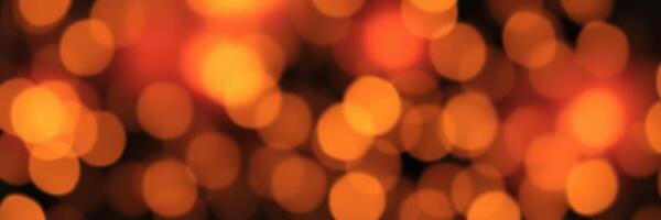 Warm glowing bokeh lights create a festive atmosphere during evening celebrations in a cozy outdoor setting photo