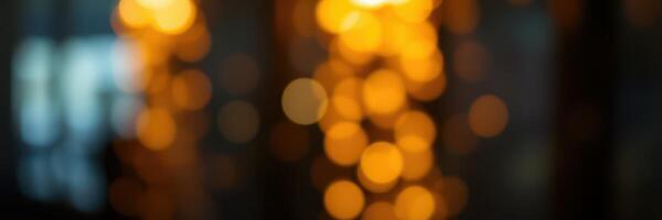 Background of blurred glowing lights creating a warm atmosphere in an indoor setting during evening hours photo