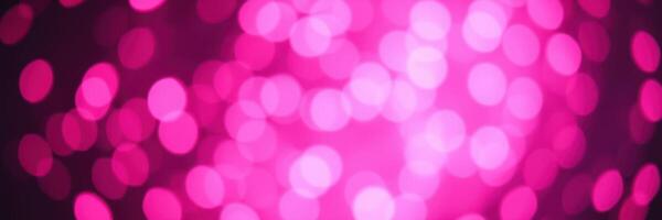 Vibrant pink bokeh lights create a festive atmosphere for celebrations and events during nighttime gatherings photo