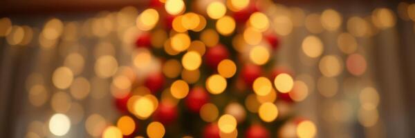 Holiday celebration with Christmas tree adorned in warm lights and colorful decorations in cozy indoor setting photo