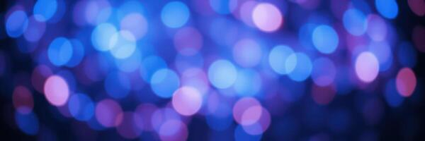Colorful bokeh lights creating a dreamy atmosphere in a nighttime setting photo