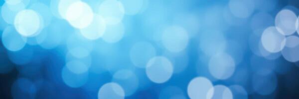 Soft blue bokeh lights create a tranquil atmosphere in an abstract composition suitable for backgrounds and design photo
