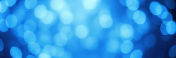 Vibrant blue bokeh lights create a dreamy atmosphere in an abstract setting photo