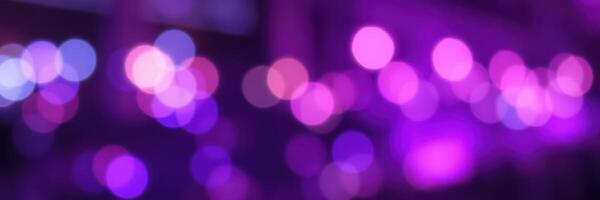 Colorful bokeh lights create a vibrant atmosphere at evening celebration event in urban setting photo