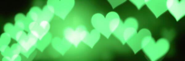 Colorful green heart shapes create a vibrant atmosphere for celebrations and events at night photo