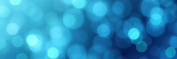 Abstract blue bokeh background created by soft and blurred light effects in a serene atmosphere photo