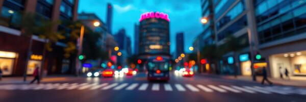 City street at dusk with blurred traffic and pedestrian crossing photo