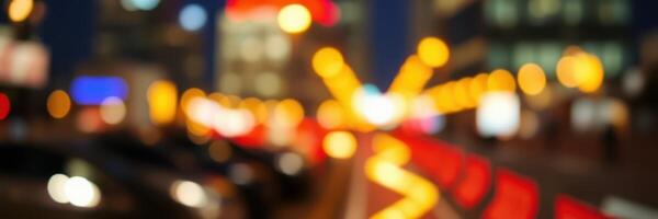 City lights illuminate a bustling street at night with blurred motion creating a vibrant atmosphere photo
