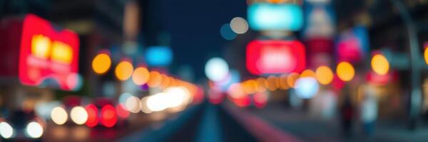 Nightlife in the city with blurred lights creating a vibrant atmosphere and a sense of motion along a busy street photo