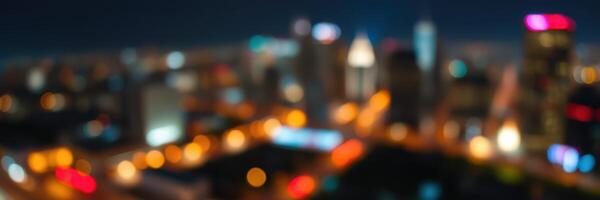 City skyline illuminated at night with colorful lights and a vibrant urban atmosphere photo