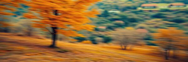 Vibrant autumn landscape with blurred orange trees and distant cottages in a serene rural setting photo