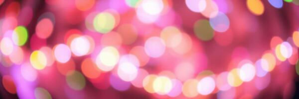 Colorful bokeh lights create a vibrant atmosphere during a festive celebration at night photo