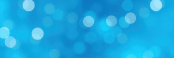 Colorful abstract background with blue hues and blurred circular shapes creating a dreamy atmosphere photo