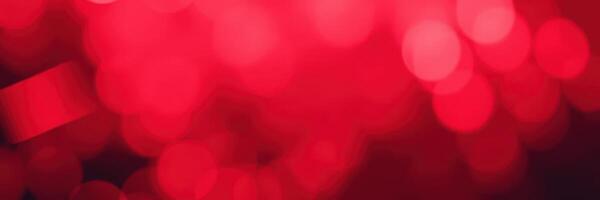 Colorful abstract background with varying shades of red and light bokeh effects during a festive evening event in a vibrant city atmosphere photo
