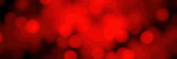 Vibrant red bokeh lights create a warm and festive atmosphere during an evening celebration or event photo