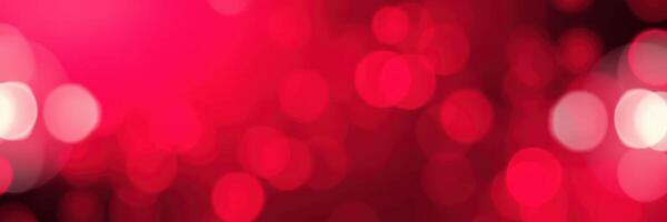 Abstract red bokeh background featuring soft circular light patterns and a vibrant color palette photo