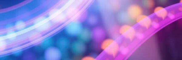 Colorful light patterns create a vibrant background in a lively atmosphere during a nighttime event photo
