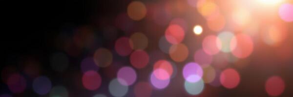 Colorful bokeh lights create a festive atmosphere during a nighttime celebration of joy and togetherness photo