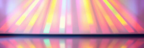 Colorful light rays create vibrant reflections on a glossy surface during an energetic dance performance photo