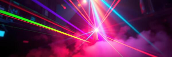 Colorful laser display creates vibrant atmosphere at nighttime event in urban setting photo