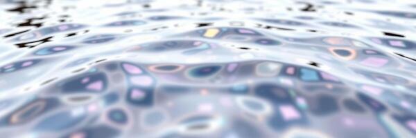 Rippling water surface reflecting light and colors during a sunny day on a tranquil lake photo