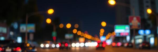 City street illuminated at night with blurred lights and moving vehicles creating a dynamic urban atmosphere photo