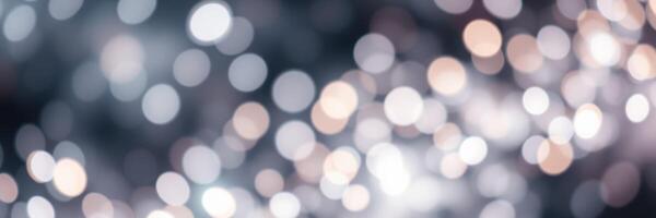 Soft bokeh lights create a dreamy atmosphere in a blurred background during a festive celebration at night photo