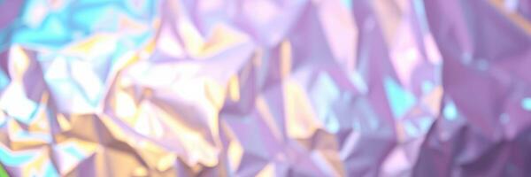 Colorful abstract background created using crumpled metallic foil illuminated by soft lighting photo