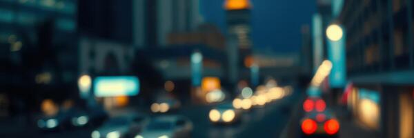 Urban street at dusk with blurred traffic lights and building silhouettes in a busy city photo